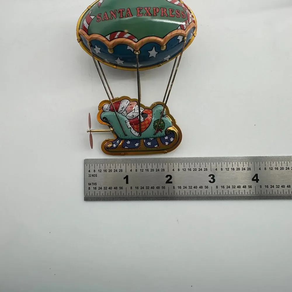 2000 Hallmark Keepsake Merry Ballooning Santa Express Pressed Tin Ornament